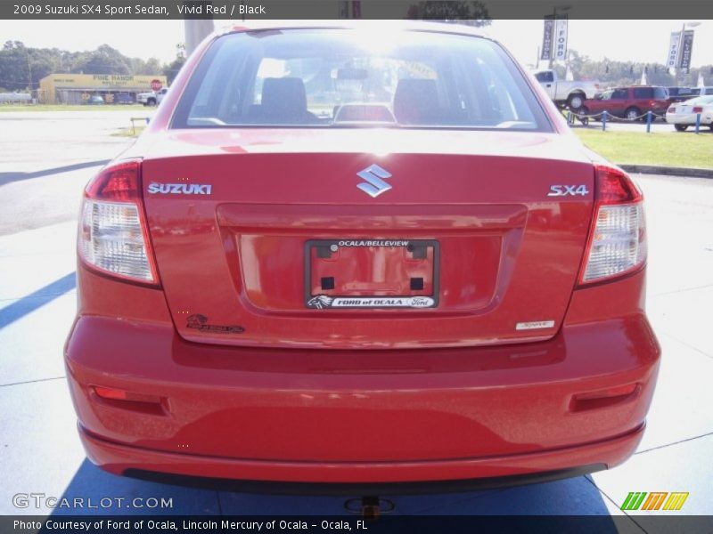 Vivid Red / Black 2009 Suzuki SX4 Sport Sedan