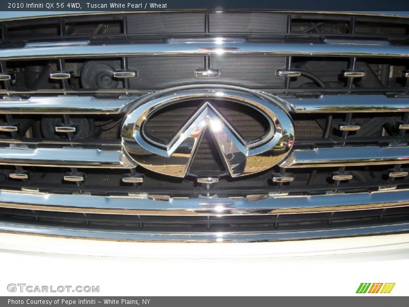 Tuscan White Pearl / Wheat 2010 Infiniti QX 56 4WD