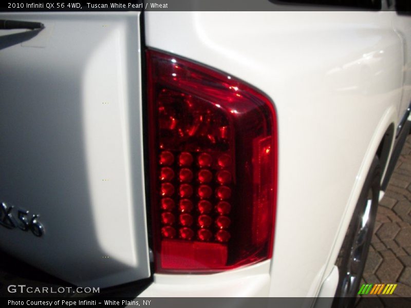 Tuscan White Pearl / Wheat 2010 Infiniti QX 56 4WD
