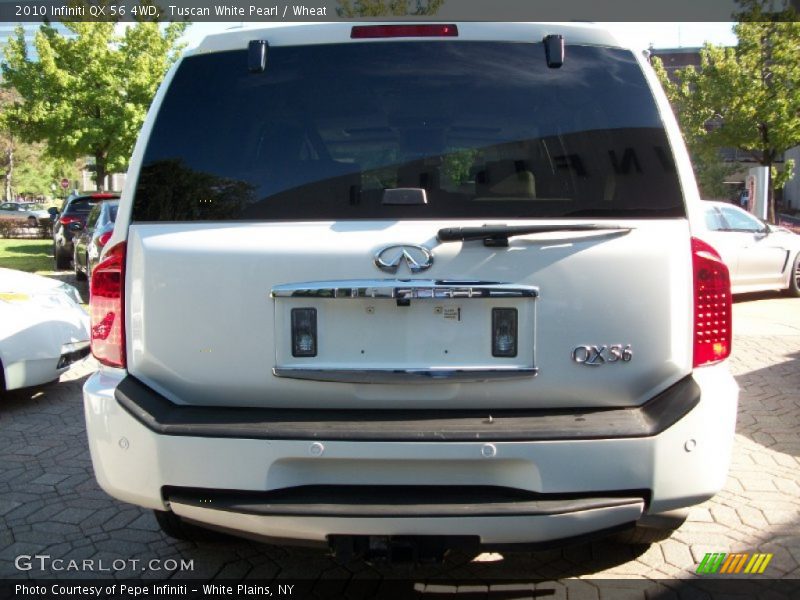 Tuscan White Pearl / Wheat 2010 Infiniti QX 56 4WD