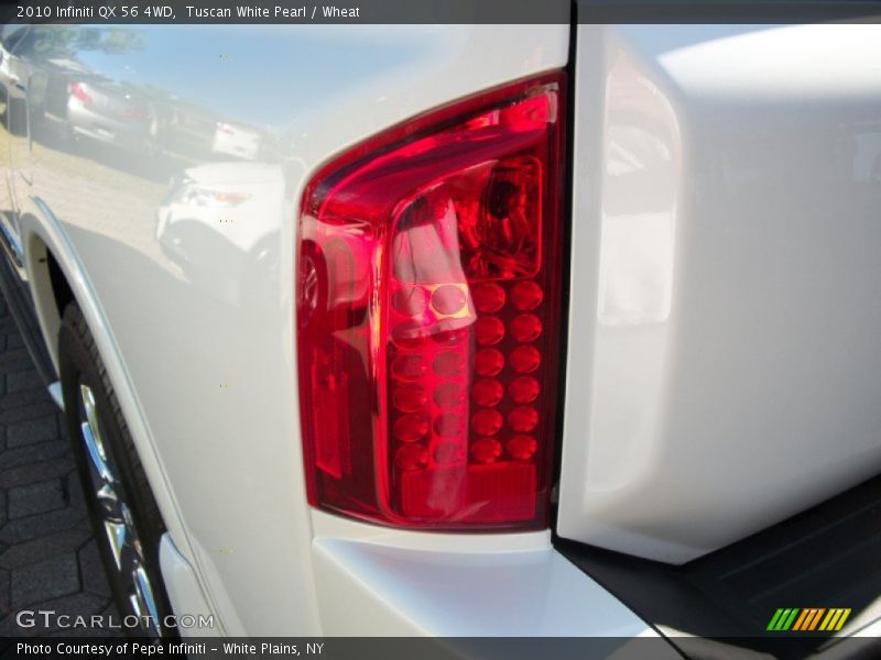 Tuscan White Pearl / Wheat 2010 Infiniti QX 56 4WD