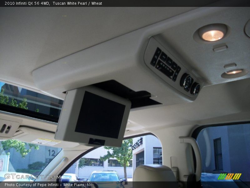 Tuscan White Pearl / Wheat 2010 Infiniti QX 56 4WD