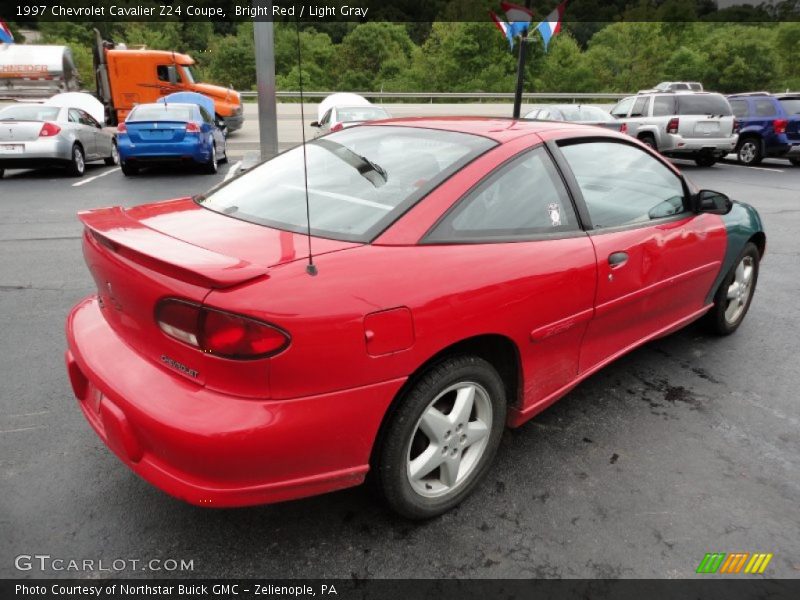 Bright Red / Light Gray 1997 Chevrolet Cavalier Z24 Coupe