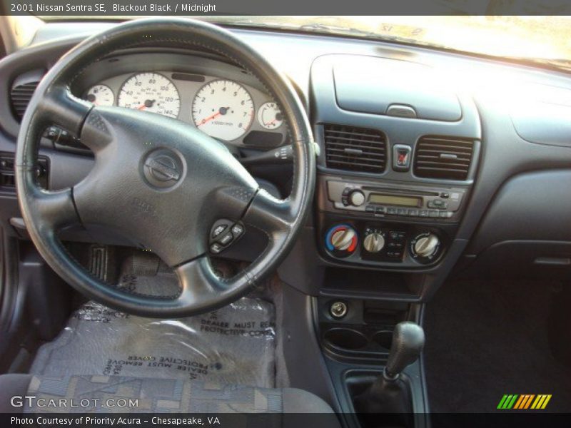 Blackout Black / Midnight 2001 Nissan Sentra SE