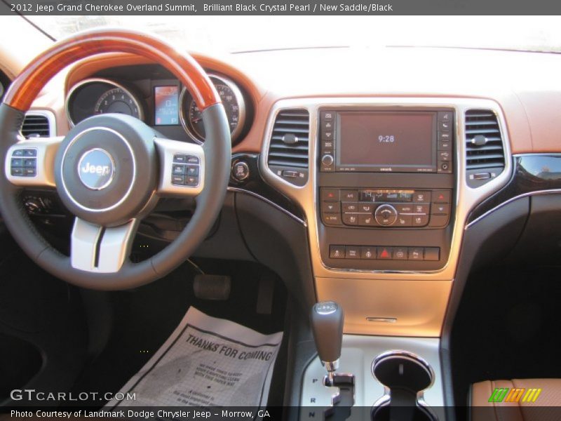 Brilliant Black Crystal Pearl / New Saddle/Black 2012 Jeep Grand Cherokee Overland Summit