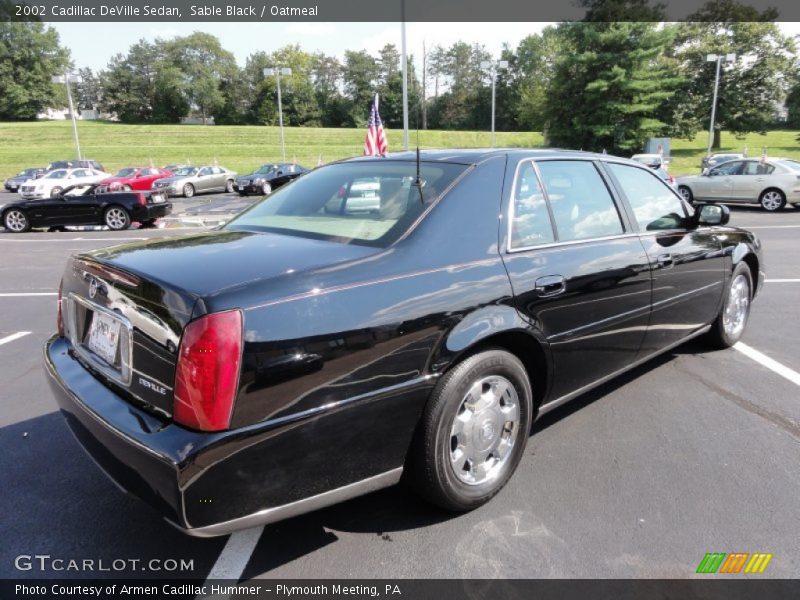 Sable Black / Oatmeal 2002 Cadillac DeVille Sedan