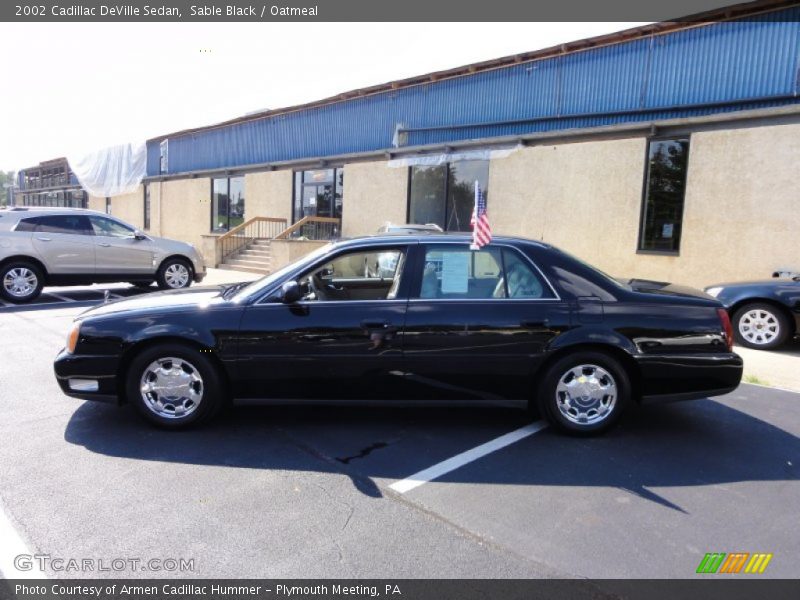 Sable Black / Oatmeal 2002 Cadillac DeVille Sedan