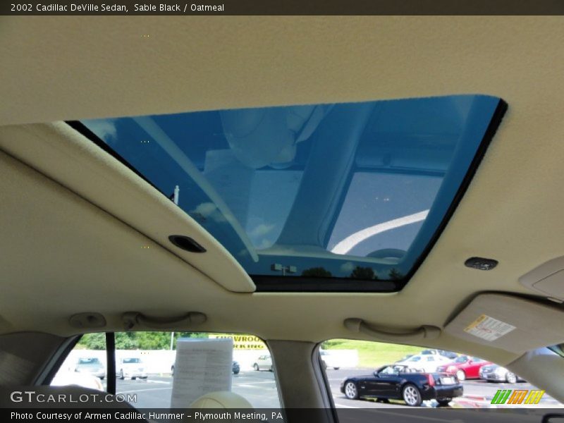 Sable Black / Oatmeal 2002 Cadillac DeVille Sedan