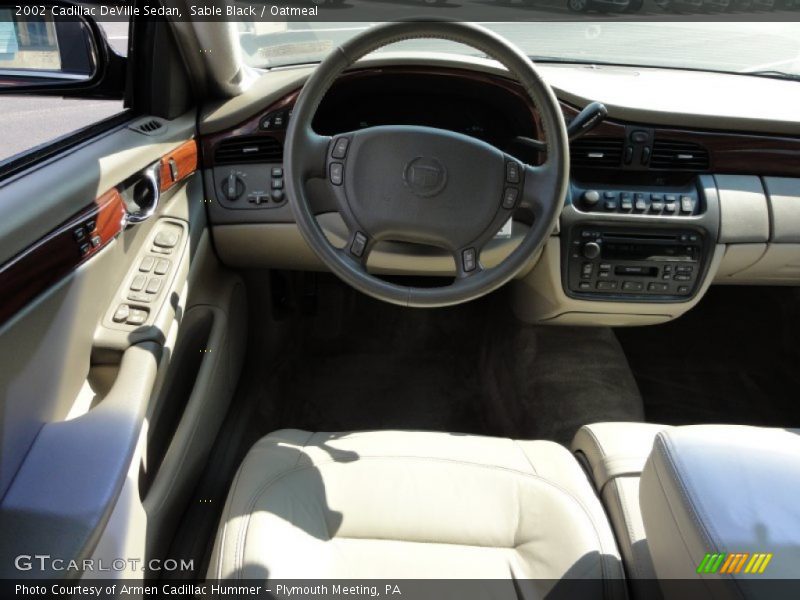 Sable Black / Oatmeal 2002 Cadillac DeVille Sedan