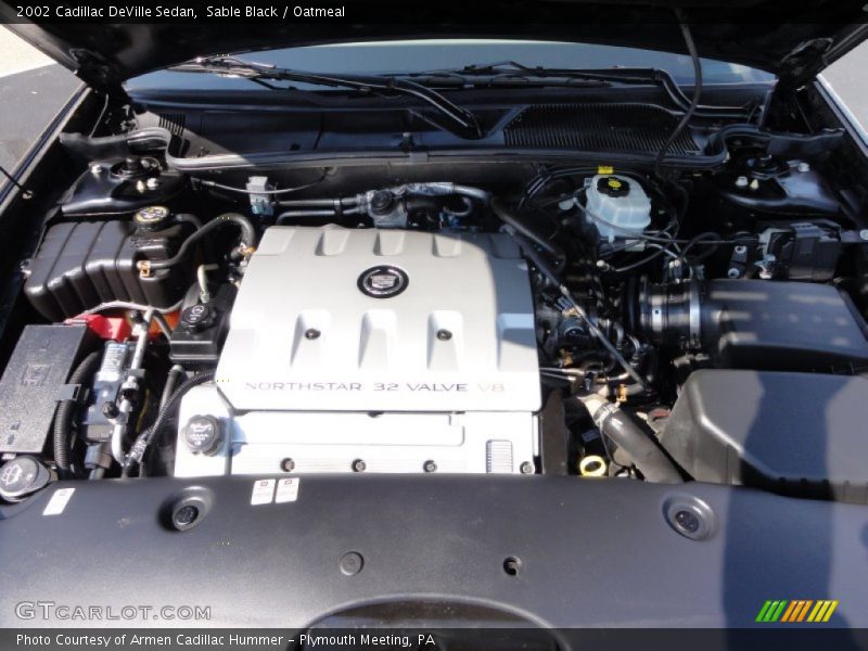 Sable Black / Oatmeal 2002 Cadillac DeVille Sedan