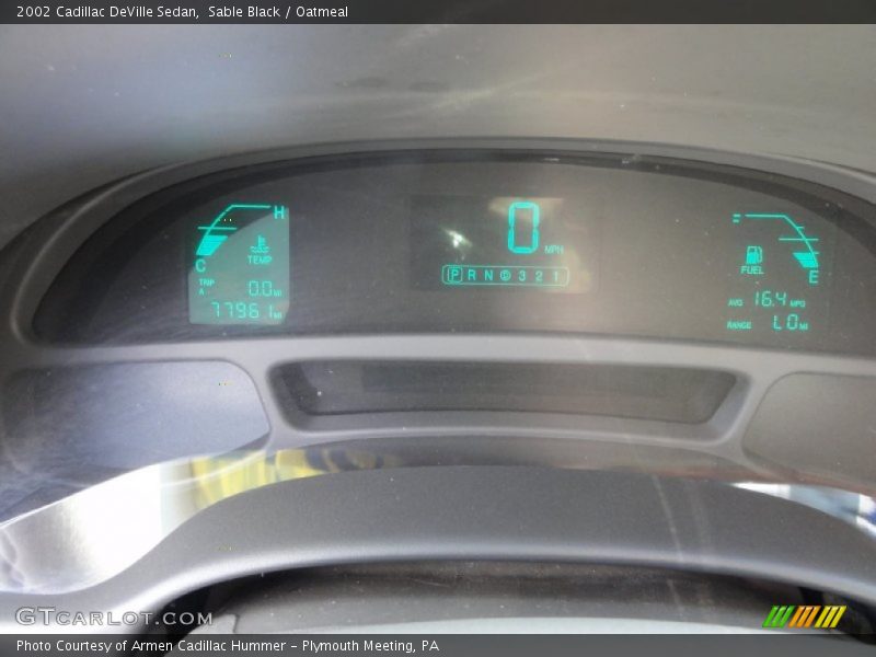 Sable Black / Oatmeal 2002 Cadillac DeVille Sedan