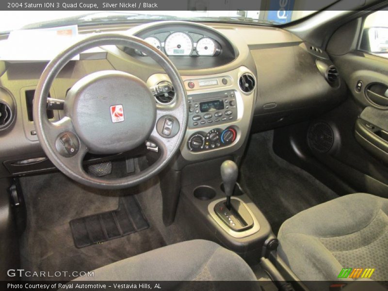 Dashboard of 2004 ION 3 Quad Coupe
