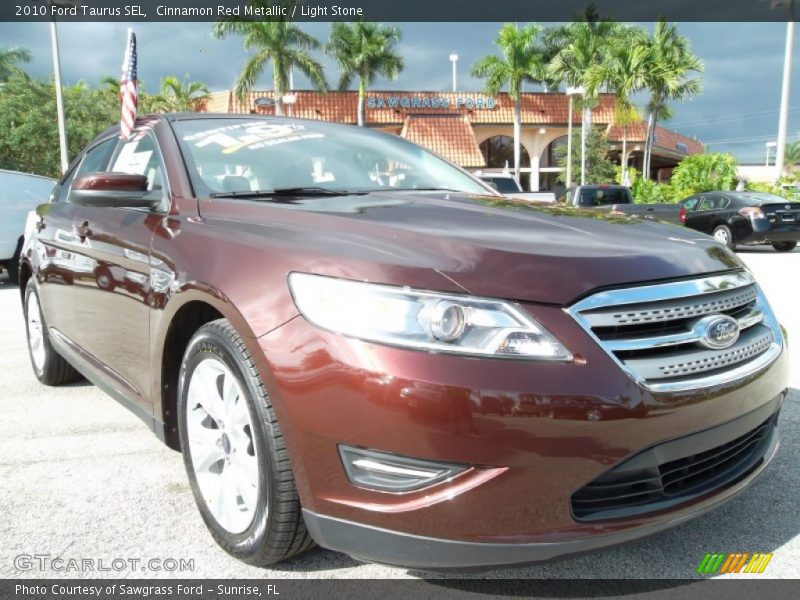 Cinnamon Red Metallic / Light Stone 2010 Ford Taurus SEL