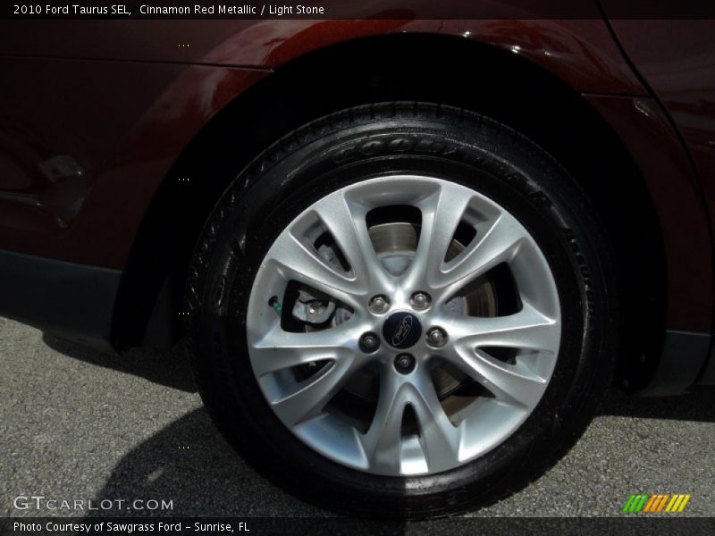 Cinnamon Red Metallic / Light Stone 2010 Ford Taurus SEL
