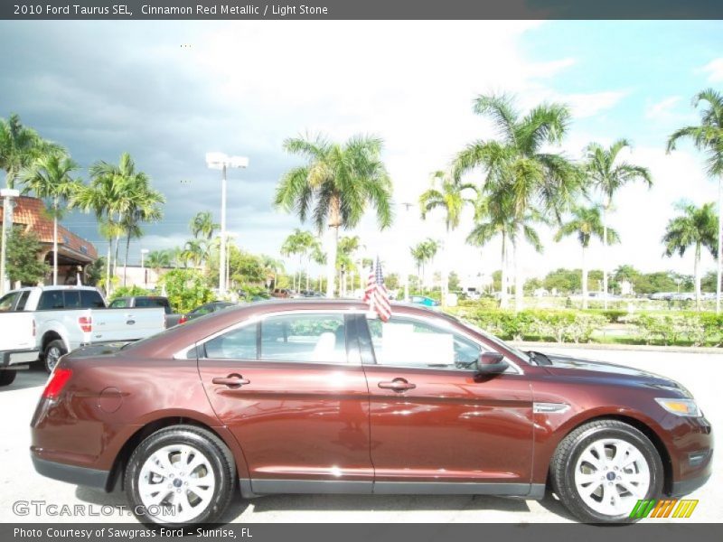Cinnamon Red Metallic / Light Stone 2010 Ford Taurus SEL