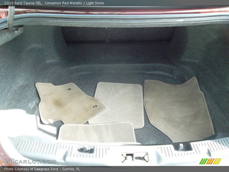 Cinnamon Red Metallic / Light Stone 2010 Ford Taurus SEL