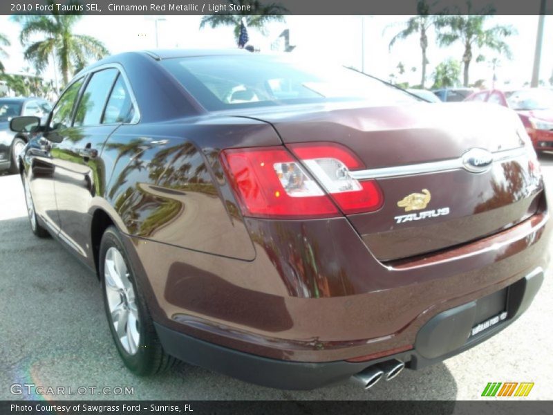 Cinnamon Red Metallic / Light Stone 2010 Ford Taurus SEL