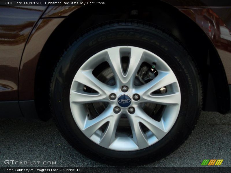 Cinnamon Red Metallic / Light Stone 2010 Ford Taurus SEL
