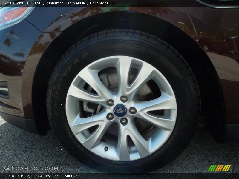 Cinnamon Red Metallic / Light Stone 2010 Ford Taurus SEL