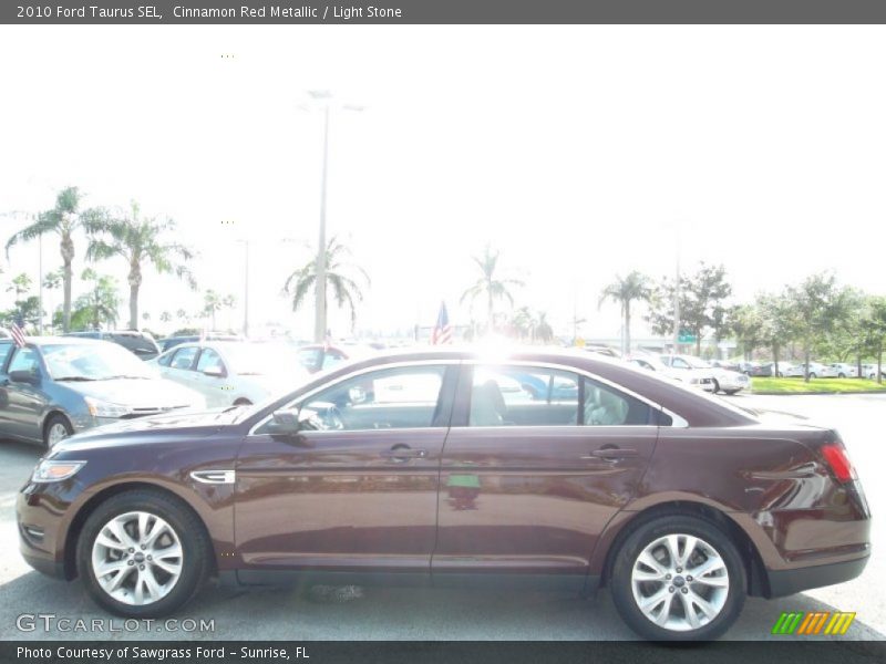 Cinnamon Red Metallic / Light Stone 2010 Ford Taurus SEL