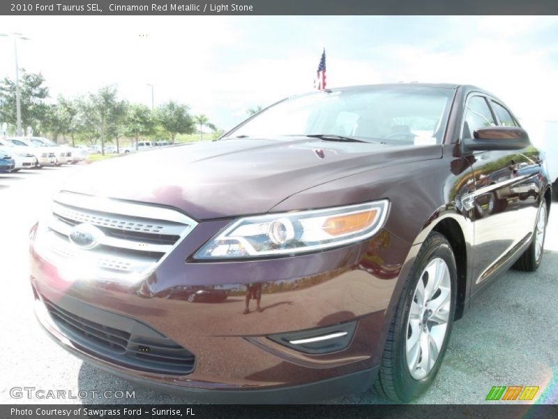 Cinnamon Red Metallic / Light Stone 2010 Ford Taurus SEL