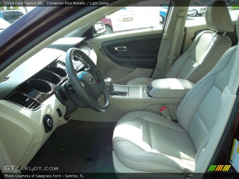 Cinnamon Red Metallic / Light Stone 2010 Ford Taurus SEL