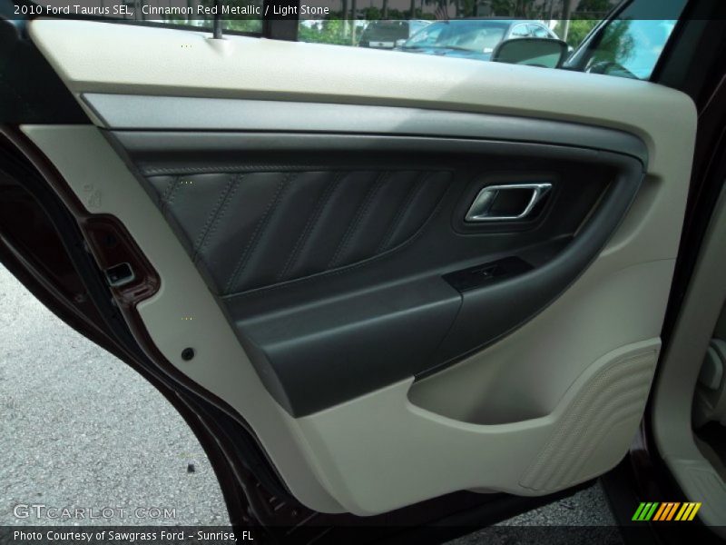Cinnamon Red Metallic / Light Stone 2010 Ford Taurus SEL