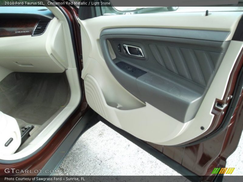 Cinnamon Red Metallic / Light Stone 2010 Ford Taurus SEL