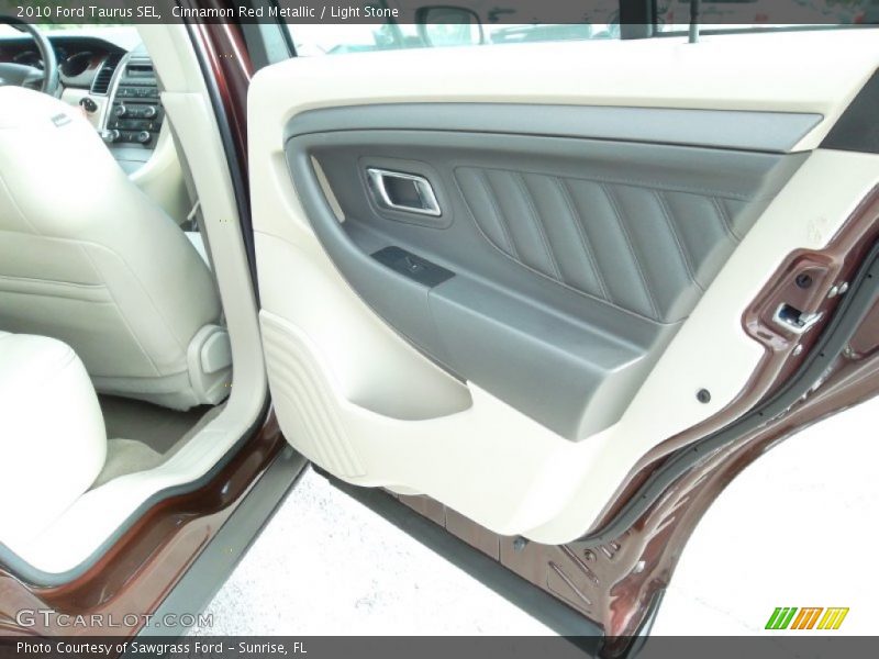 Cinnamon Red Metallic / Light Stone 2010 Ford Taurus SEL