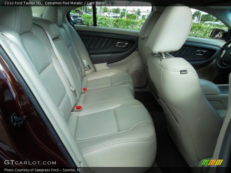 Cinnamon Red Metallic / Light Stone 2010 Ford Taurus SEL