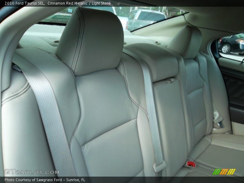 Cinnamon Red Metallic / Light Stone 2010 Ford Taurus SEL