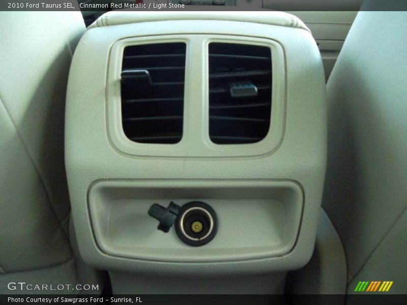 Cinnamon Red Metallic / Light Stone 2010 Ford Taurus SEL
