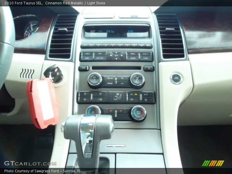 Cinnamon Red Metallic / Light Stone 2010 Ford Taurus SEL
