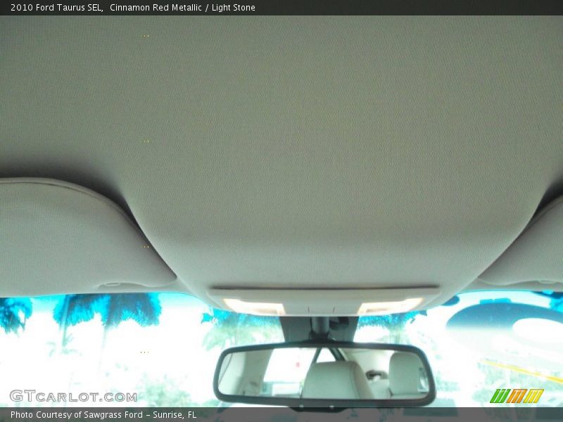 Cinnamon Red Metallic / Light Stone 2010 Ford Taurus SEL