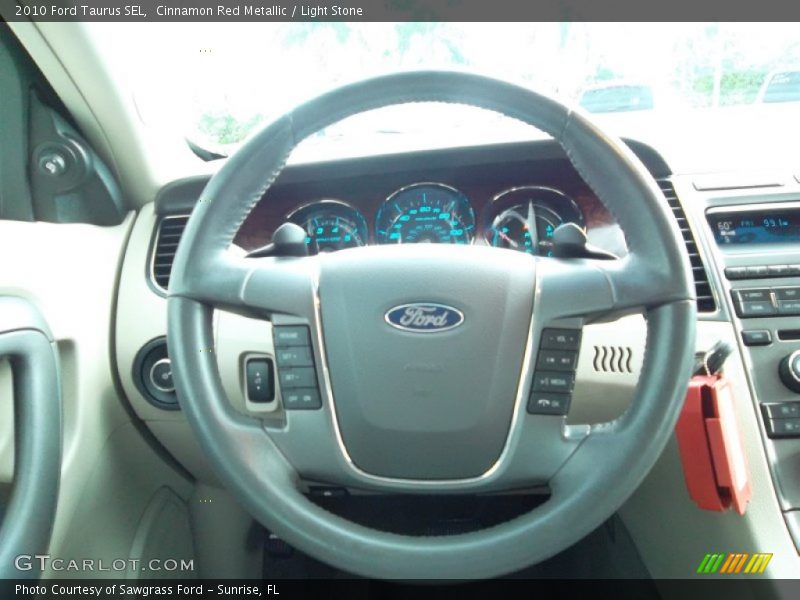 Cinnamon Red Metallic / Light Stone 2010 Ford Taurus SEL
