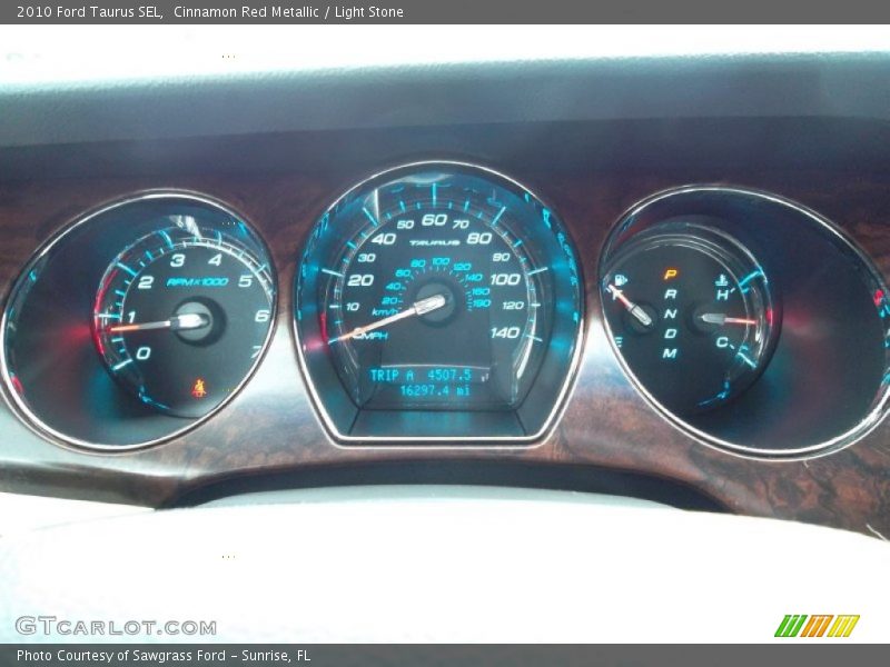 Cinnamon Red Metallic / Light Stone 2010 Ford Taurus SEL