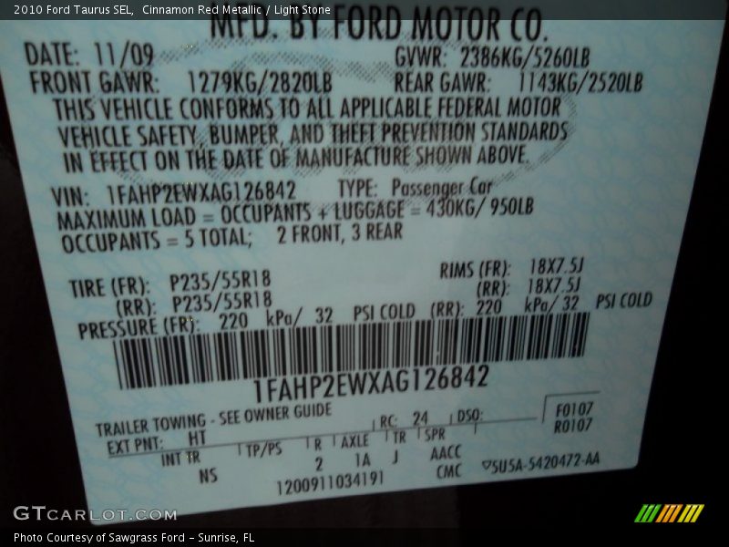 Cinnamon Red Metallic / Light Stone 2010 Ford Taurus SEL
