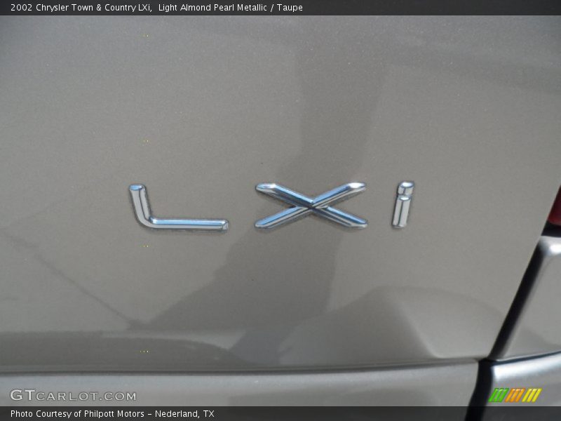  2002 Town & Country LXi Logo