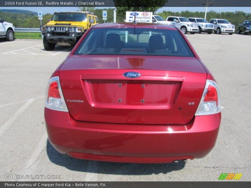 Redfire Metallic / Charcoal Black 2009 Ford Fusion SE