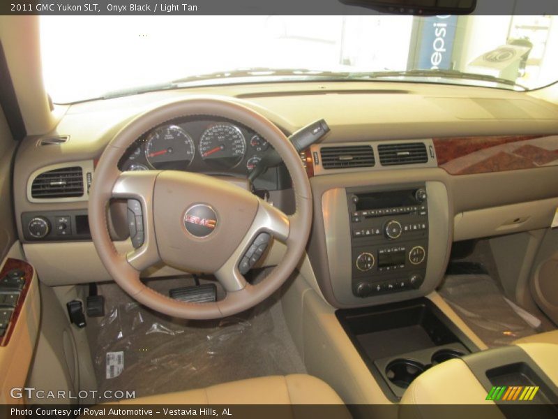 Onyx Black / Light Tan 2011 GMC Yukon SLT