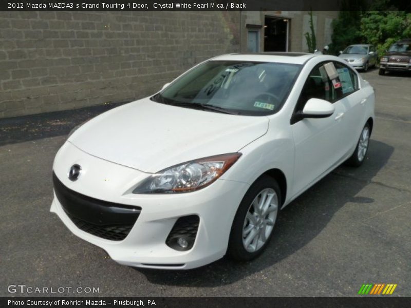 Front 3/4 View of 2012 MAZDA3 s Grand Touring 4 Door