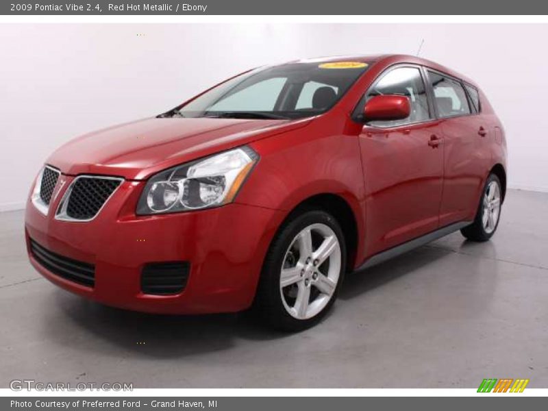 Red Hot Metallic / Ebony 2009 Pontiac Vibe 2.4