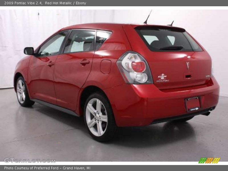 Red Hot Metallic / Ebony 2009 Pontiac Vibe 2.4