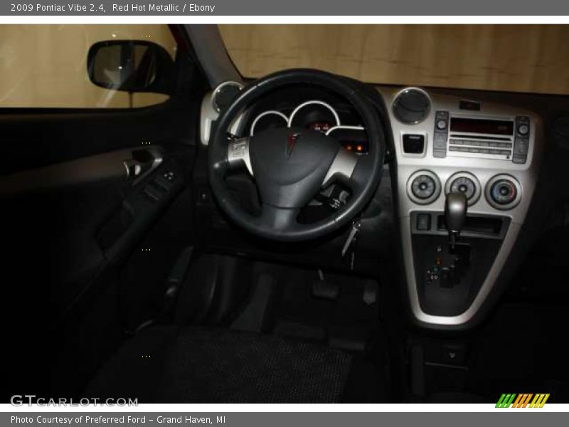 Red Hot Metallic / Ebony 2009 Pontiac Vibe 2.4