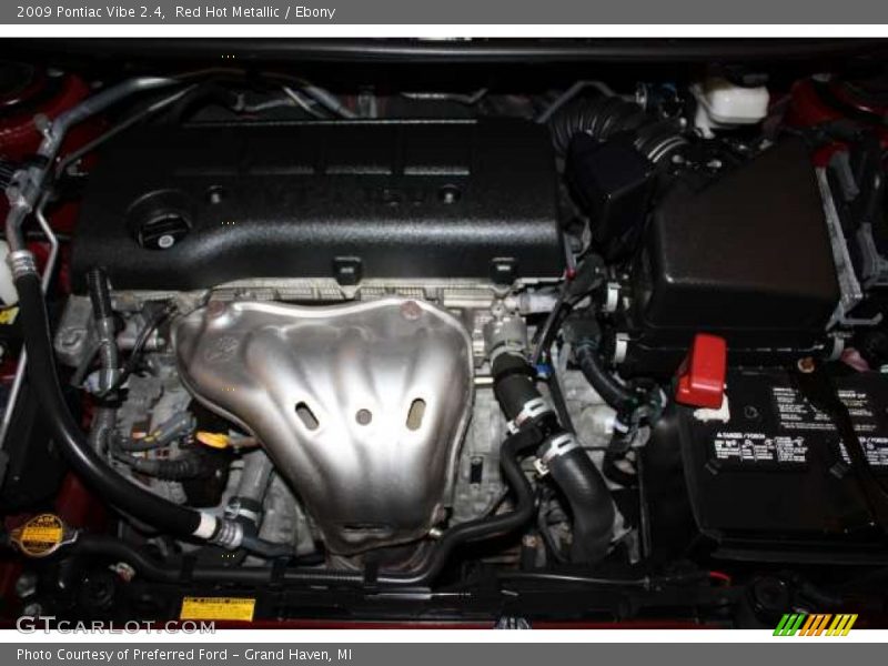 Red Hot Metallic / Ebony 2009 Pontiac Vibe 2.4