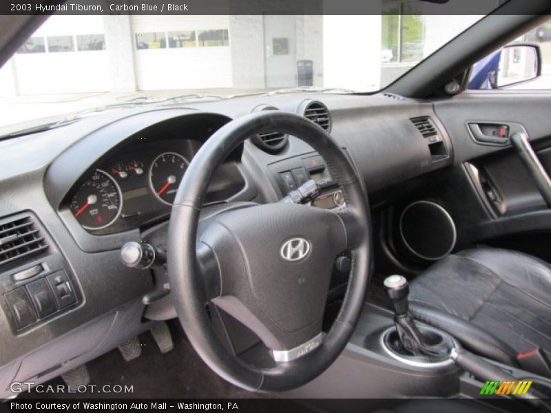 Dashboard of 2003 Tiburon 