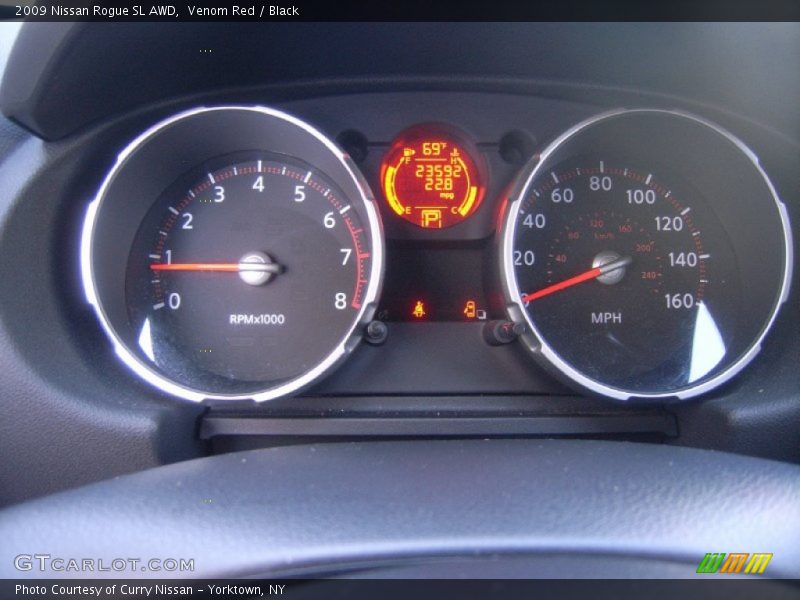 Venom Red / Black 2009 Nissan Rogue SL AWD