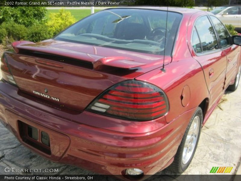 Redfire Metallic / Dark Pewter 2002 Pontiac Grand Am SE Sedan