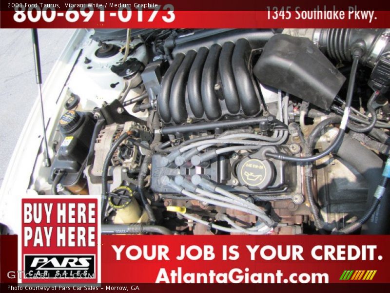 Vibrant White / Medium Graphite 2001 Ford Taurus