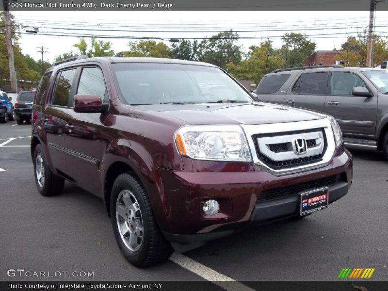 Dark Cherry Pearl / Beige 2009 Honda Pilot Touring 4WD